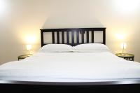A bed or beds in a room at Urban Pop Bnb