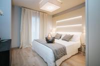 Posteľ alebo postele v izbe v ubytovaní Aparthotel Touring