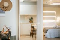 Posteľ alebo postele v izbe v ubytovaní Aparthotel Touring