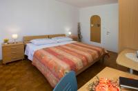 Postel nebo postele na pokoji v ubytování City getaway - apartment Ileora