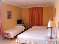 Posteľ alebo postele v izbe v ubytovaní Hotel San Camilo