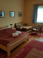Łóżko lub łóżka w pokoju w obiekcie Grand Hotel