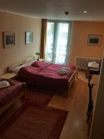 Łóżko lub łóżka w pokoju w obiekcie Grand Hotel