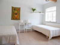 Postel nebo postele na pokoji v ubytování Mellem-rummet Guesthouse & Glamping