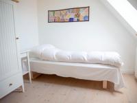 Postel nebo postele na pokoji v ubytování Mellem-rummet Guesthouse & Glamping