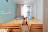 Posteľ alebo postele v izbe v ubytovaní Apartments Ivanka 378