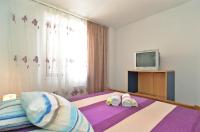 Posteľ alebo postele v izbe v ubytovaní Apartments Ivanka 378