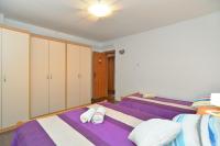 Posteľ alebo postele v izbe v ubytovaní Apartments Ivanka 378