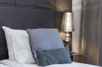 Posteľ alebo postele v izbe v ubytovaní Elite Apartments Chmielna Deluxe