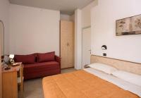 Posteľ alebo postele v izbe v ubytovaní Hotel Verdemare
