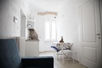 A kitchen or kitchenette at Tre Archi Apartment & Relais