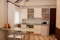 A kitchen or kitchenette at Apartamentos Costa Esmeralda