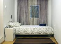 Posteľ alebo postele v izbe v ubytovaní Apartment Karega