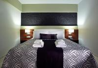 Posteľ alebo postele v izbe v ubytovaní Eleftheria Hotel