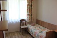 Postel nebo postele na pokoji v ubytování Hotel Radik