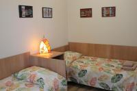 Postel nebo postele na pokoji v ubytování Hotel Radik