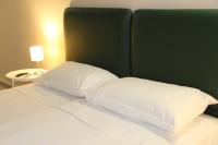 A bed or beds in a room at Urban Pop Bnb