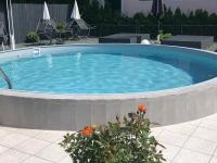 The swimming pool at or close to Enjoyit Rooms