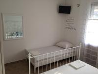 Postel nebo postele na pokoji v ubytování Jerkovic Apartment