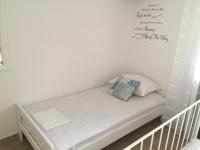 Postel nebo postele na pokoji v ubytování Jerkovic Apartment