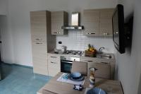 Kuchyňa alebo kuchynka v ubytovaní Casa del Porto al Borgo Marinari