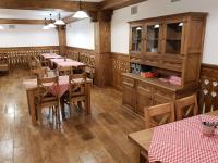 Reštaurácia alebo iné gastronomické zariadenie v ubytovaní Tatragolf Mountain Resort
