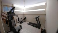 Fitness centrum a/nebo fitness zařízení v ubytování Cozy Apartments near the airport