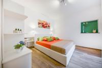 A bed or beds in a room at Marechiaro House