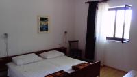 Posteľ alebo postele v izbe v ubytovaní Apartman "Tartaruga"