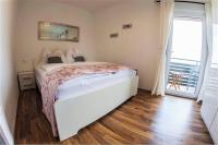 Posteľ alebo postele v izbe v ubytovaní Apartments Mojeljeto