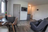 Televízia a/alebo spoločenská miestnosť v ubytovaní Apartments Mojeljeto