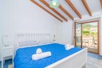 Łóżko lub łóżka w pokoju w obiekcie Casa Canals
