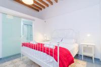 Łóżko lub łóżka w pokoju w obiekcie Casa Canals