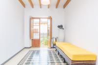 Łóżko lub łóżka w pokoju w obiekcie Casa Canals