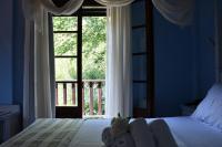 Łóżko lub łóżka w pokoju w obiekcie Hotel Manthos Blue