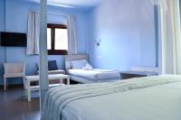 Łóżko lub łóżka w pokoju w obiekcie Hotel Manthos Blue