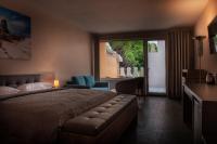 Posteľ alebo postele v izbe v ubytovaní Plaza Beach Holiday House