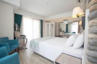 Postel nebo postele na pokoji v ubytování Dedeminn Marina Hotel