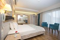 Postel nebo postele na pokoji v ubytování Dedeminn Marina Hotel