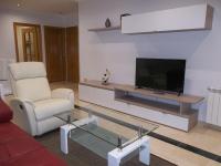 A television and/or entertainment centre at Resid. Balea Marítima
