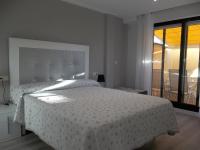 A bed or beds in a room at Resid. Balea Marítima