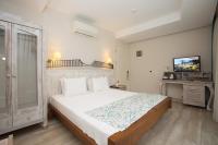 Postel nebo postele na pokoji v ubytování Dedeminn Marina Hotel