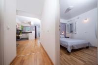Posteľ alebo postele v izbe v ubytovaní Apartment Sarena
