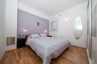Posteľ alebo postele v izbe v ubytovaní Apartment Sarena