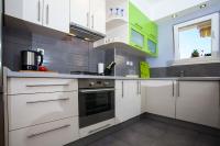 Kuchyňa alebo kuchynka v ubytovaní Apartment Sarena