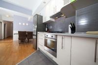 Kuchyňa alebo kuchynka v ubytovaní Apartment Sarena