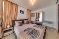 Postel nebo postele na pokoji v ubytování Apartcomplex Golden Bay