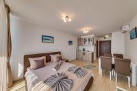 Postel nebo postele na pokoji v ubytování Apartcomplex Golden Bay