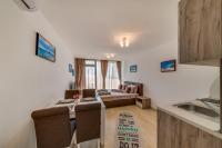 TV a/nebo společenská místnost v ubytování Apartcomplex Golden Bay
