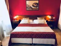 Łóżko lub łóżka w pokoju w obiekcie Hotel Borgo Antico